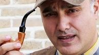 سعید داخ  در حال پیپ‌ کشیدن + عکس