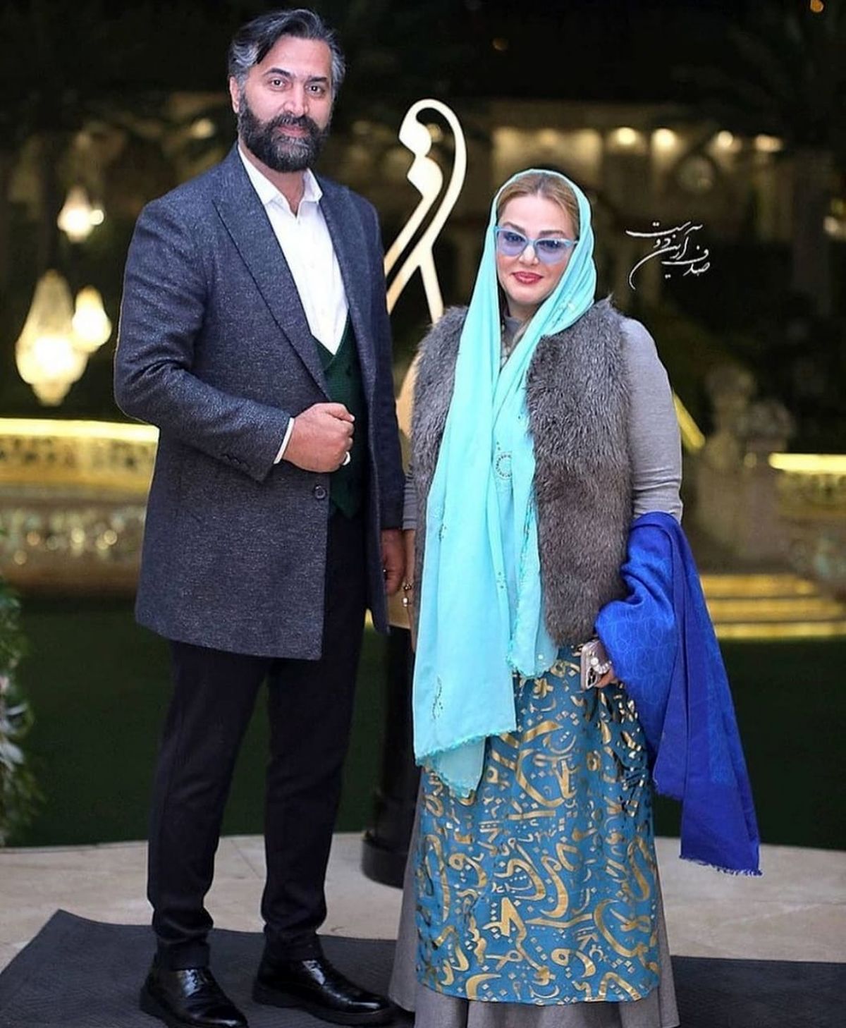 عکسی زیبا از بهاره رهنما در کنار همسرش با لباس زنانه جذاب و خوشرنگ