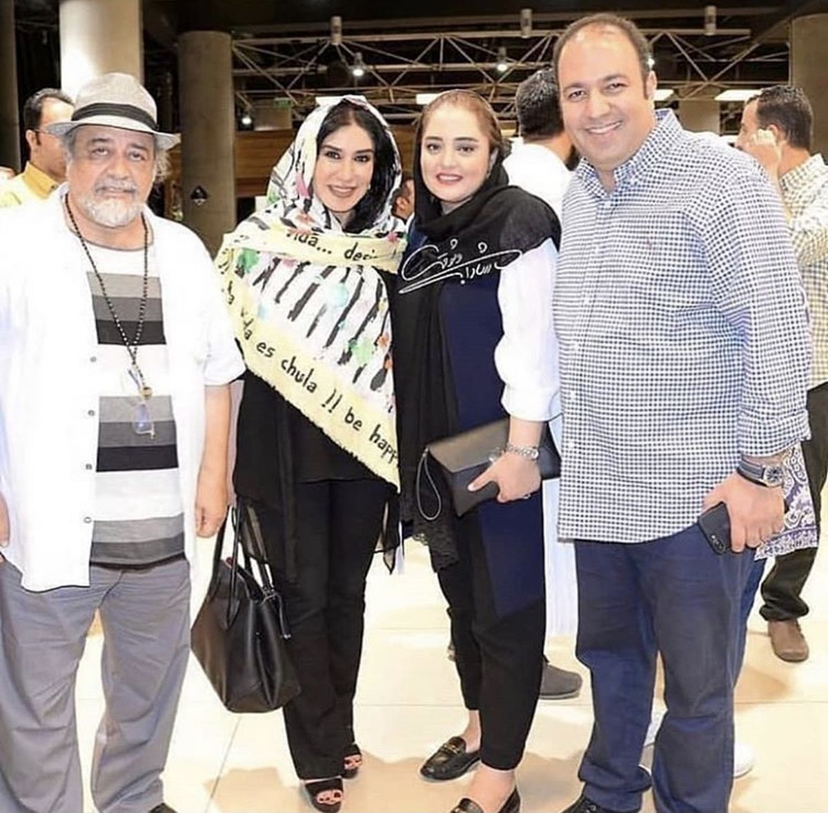 علی اوجی و‌همسرش در یک مراسم + عکس