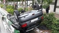 معلق ماندن پژو ۲۰۶ روی جوی آب + تصاویر