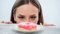 چرا دچار پرخوری عصبی می شویم و چگونه بر سلامت ما اثر می گذارد ؟