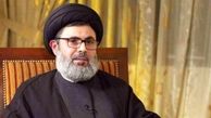 ببیند | پیکر شهید سید هاشم صفی‌ الدین در حال آماده شدن برای خاکسپاری