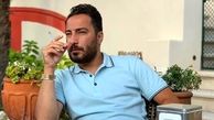 سیگار کشیدن نوید محمدزاده در کافه + عکس