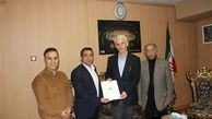 اهدای حکم سرپرستی فدراسیون کشتی به بنی تمیم توسط اسبقیان