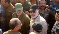 رونمایی از پوستر شهیدان سلیمانی و المهندس در عراق+ فیلم