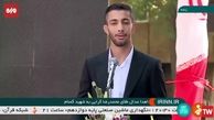 اهدای مدال طلای جهانی محمدرضا گرایی به شهید گمنام