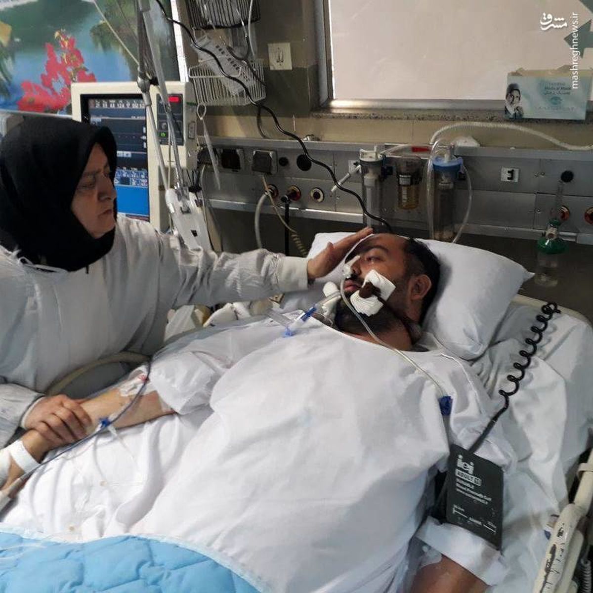 بسیجی مجروح خیابان پاسداران از کما خارج شد+ عکس