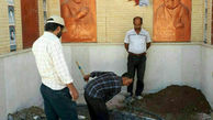 آماده سازی قبر مطهر شهید حججی (عکس)