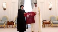 اهدای پیراهن تیم ملی فوتبال قطر به رئیسی از سوی امیر قطر
