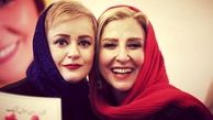 ۲ کودک در آغوش مرجانه گلچین و نعیمه نظام‌دوست
