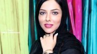 چهره لیلا اوتادی محاصره در بین گل‌ها
