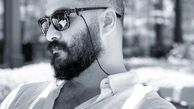 چهره در فکر فرورفته میلاد کی مرام + عکس