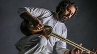 امیررضا دلاوری در حال نواختن موسیقی + عکس
