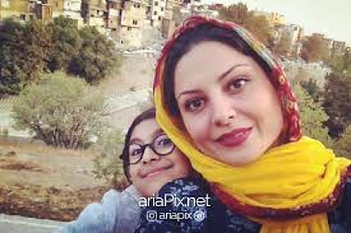 تم نارنجی سولماز غنی در این عکس
