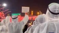  زیارت کادر درمان عراق با لباس مخصوص بیمارستان