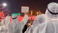  زیارت کادر درمان عراق با لباس مخصوص بیمارستان