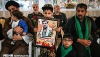 فرزند شهید امنیت در آغوش سردار سلیمانی+عکس